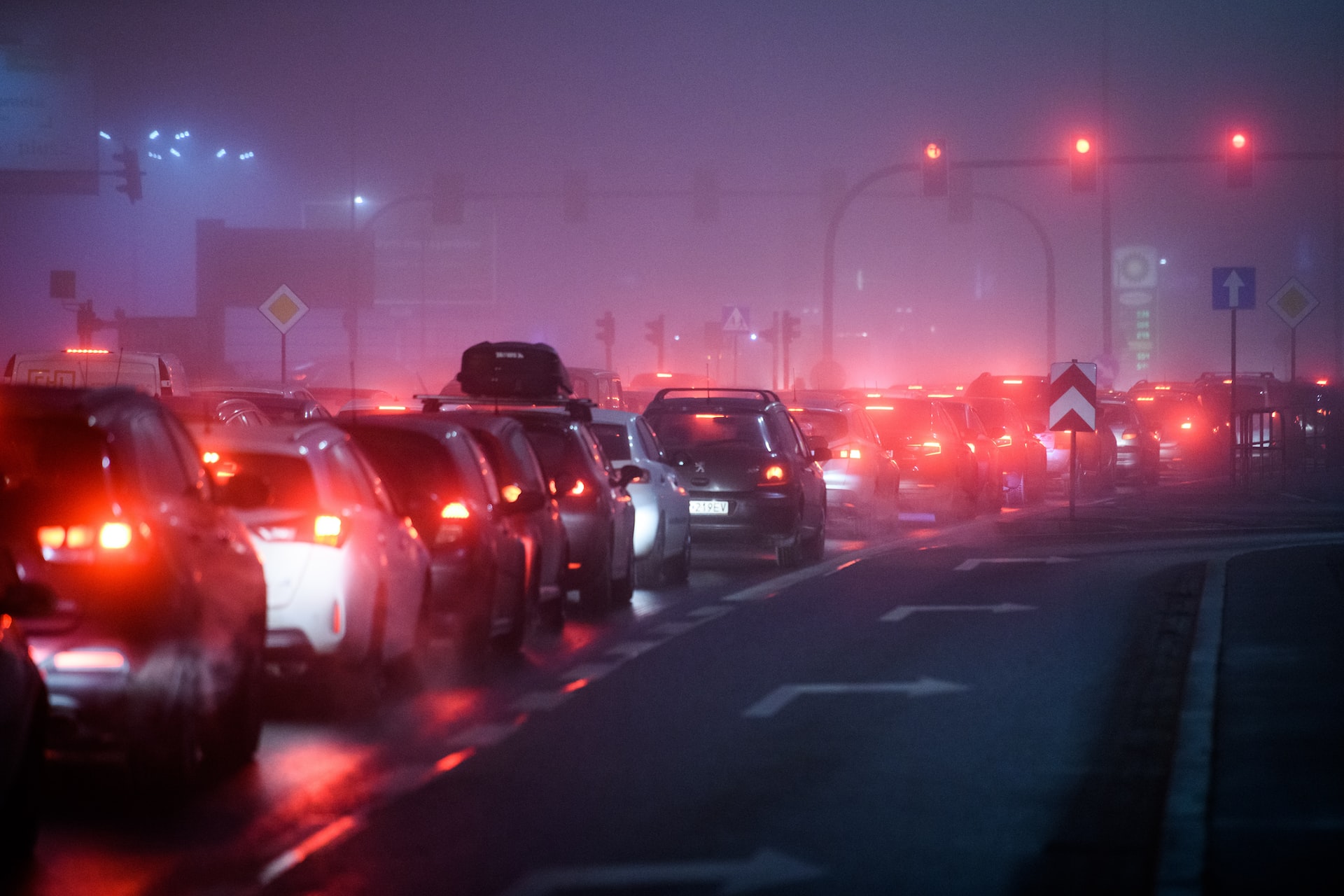 Row of cars in polluted air